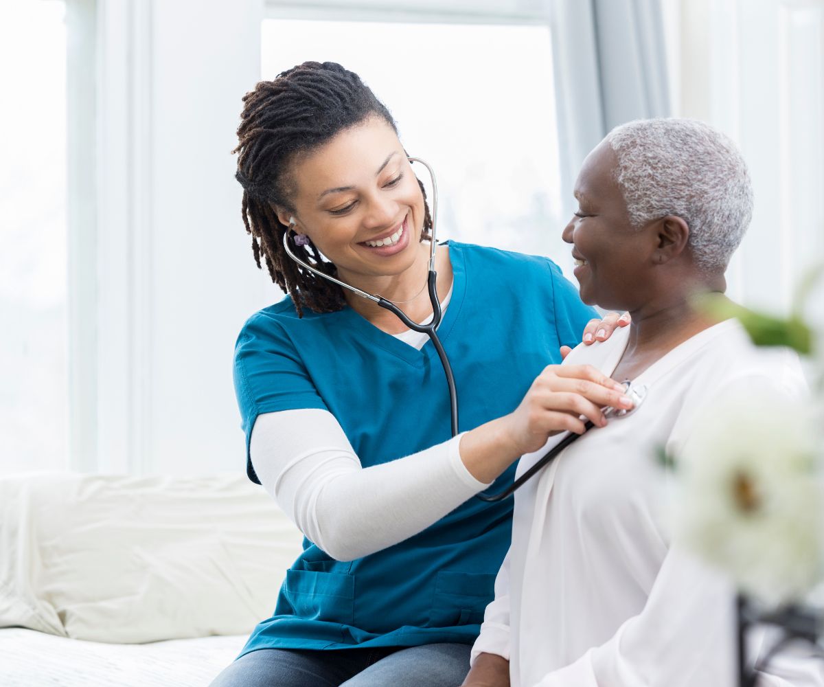 Medical Assistant working with a patient